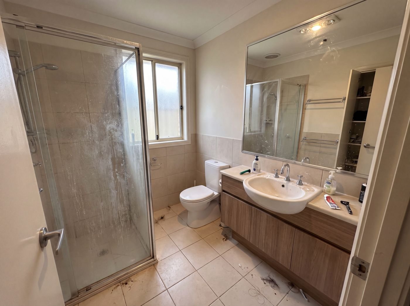 Bathroom before Sweeper Clean service